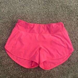 Lululemon athletic shorts in pink, size 6